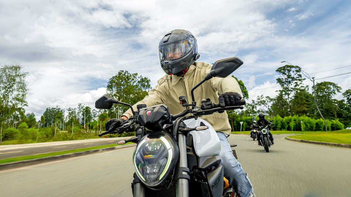 Motorcyclists riding with Sena SPIDER X Slim helmet communication systems
