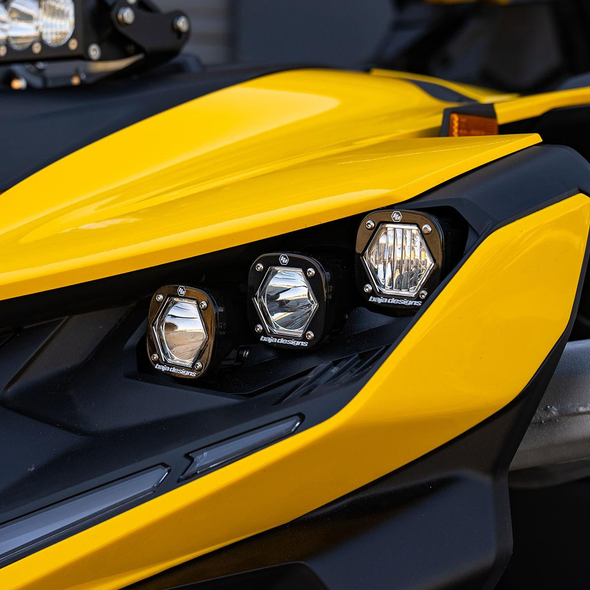 Baja Designs triple S1 headlight kit installed on Can-Am Maverick R