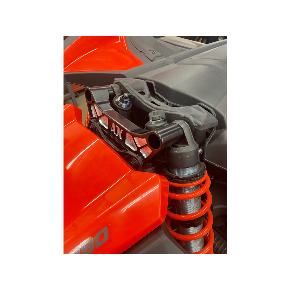 Can-Am Maverick X3 Billet Aluminum Shock Tower Brace — Can-Am Maverick X3 Billet Aluminum Shock Tower Brace by AJK Offroad Installed on Red Can-Am Right Side View
