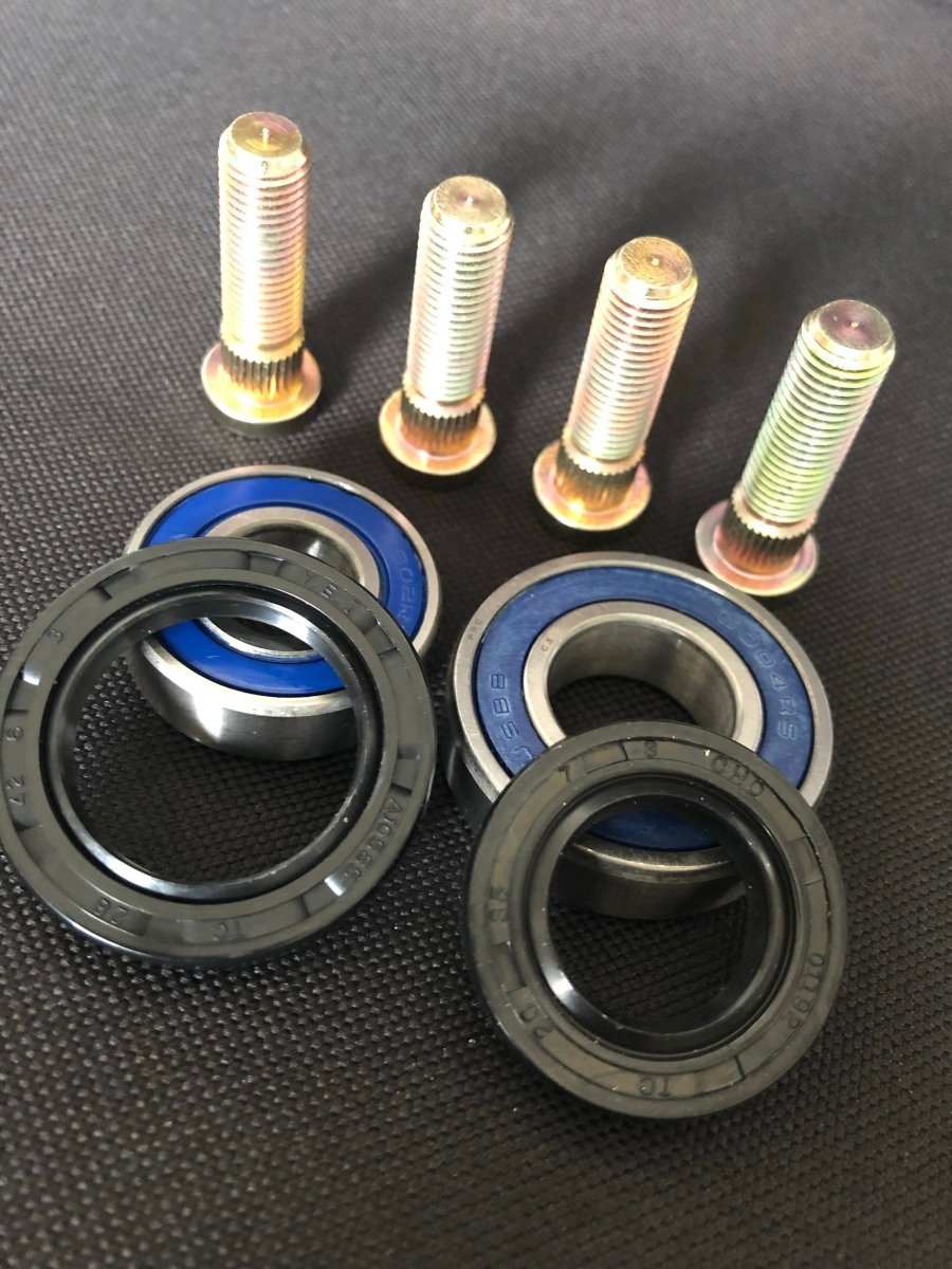 KAWASAKI hub rebuild kit for KFX 450R 400 700 with ABEC 3 bearings, seals, and extended studs