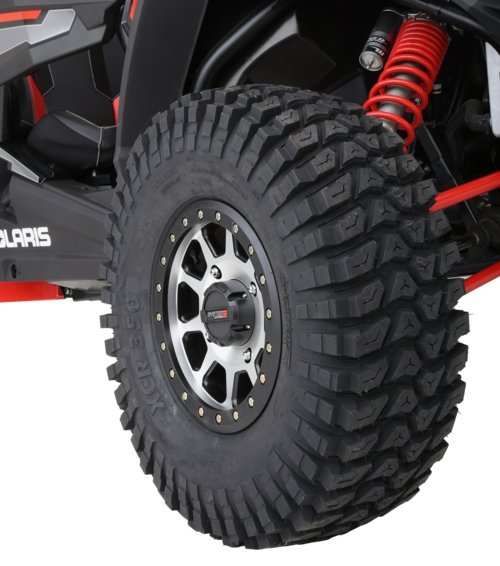 System 3 OFFROAD 15-inch beadlock wheel with aggressive XCR 350 tire mounted on Can-Am UTV