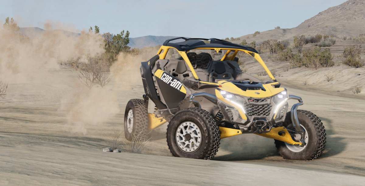 2024 Can-Am Maverick R yellow off-road UTV kicking up dust on desert trail with rugged terrain background