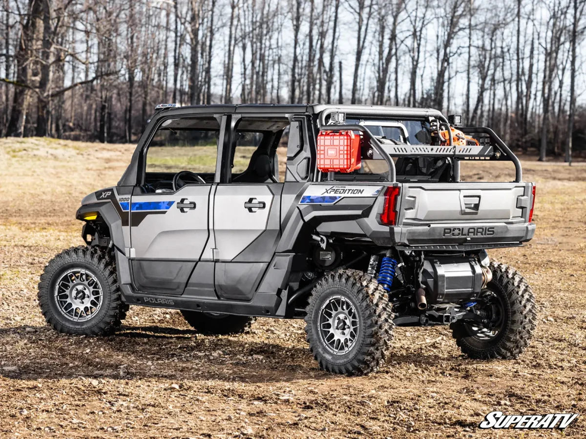 Polaris XPEDITION XP outdoors with a SuperATV cargo rack and trail equipment installed