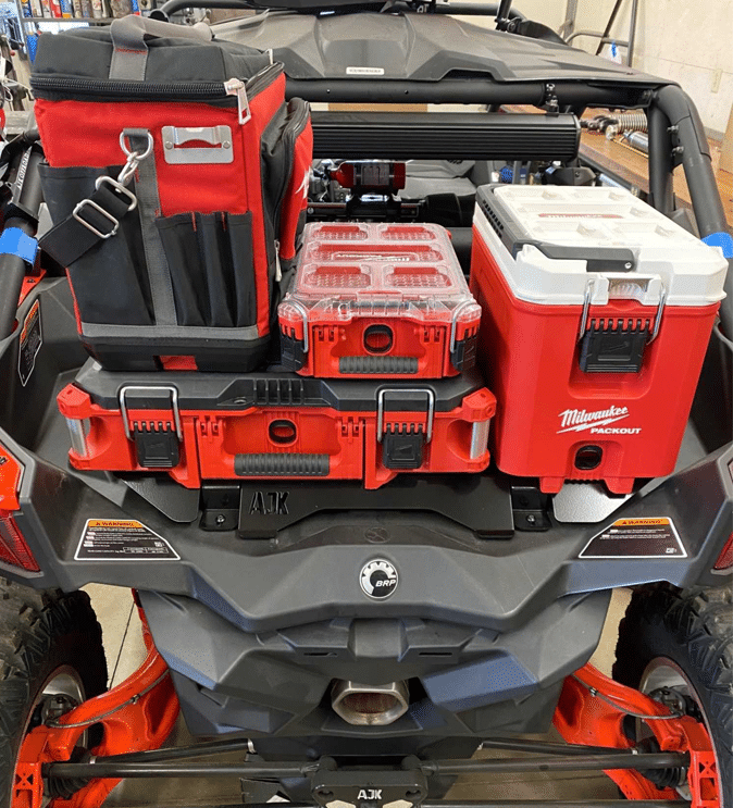 Can-Am Maverick X3 Milwaukee Packout Mount 1.5 — Can-Am X3 Milwaukee Packout Mount 1.5  AJK Offroad with 1 wide 2, and 2 kits stacked, and a cooler