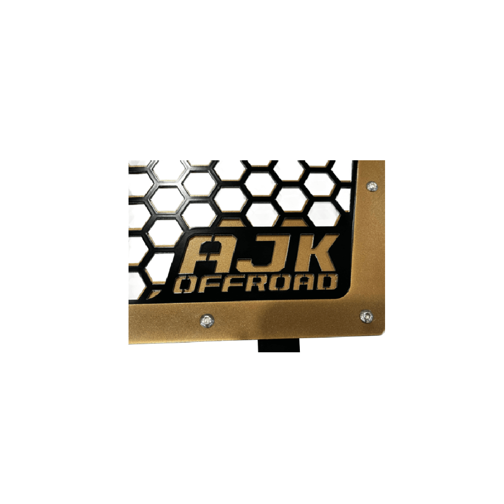 Kawasaki KRX Front Grille — Kawasaki KRX Front Grill by AJK Offroad in Bronze Close Up of Logo