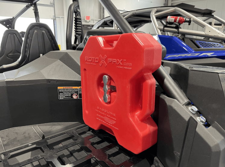Kawasaki KRX Rotopax Mount — Kawasaki KRX Rotopax Mount by AJK Offroad with Gas Tank Installed Side Close Up