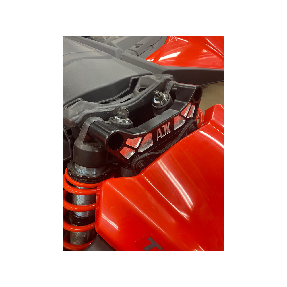 Can-Am Maverick X3 Billet Aluminum Shock Tower Brace — Can-Am Maverick X3 Billet Aluminum Shock Tower Brace by AJK Offroad Installed on Red Can-Am Left Side View
